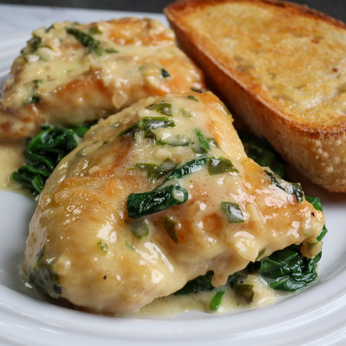 finished dish with the chicken florentine on a plate