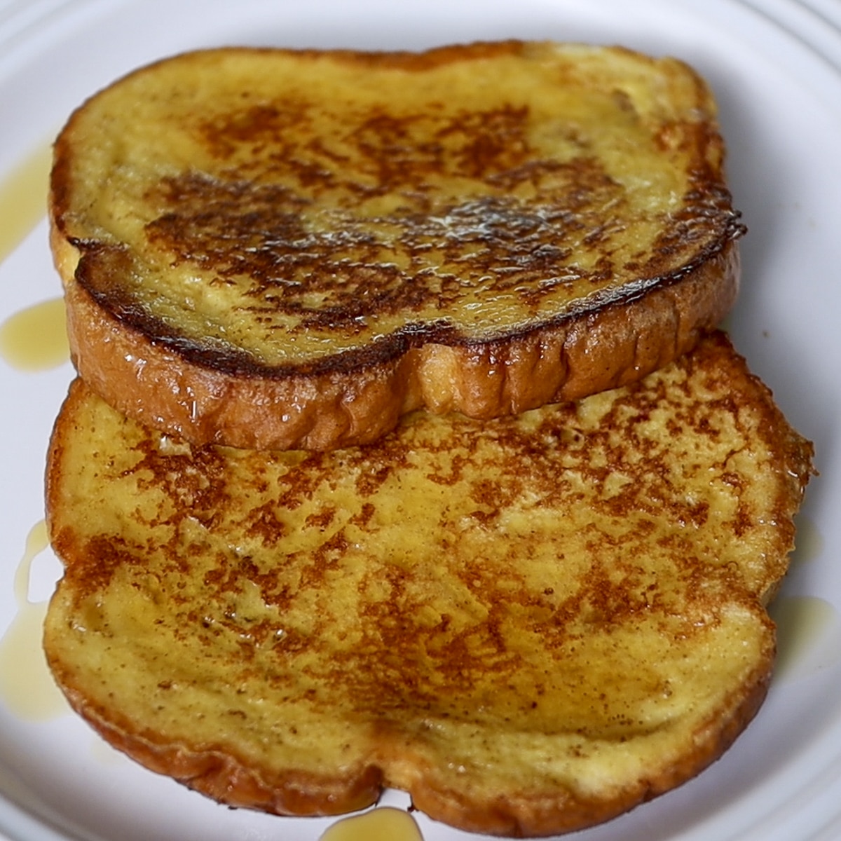French toast with syrup on a plate
