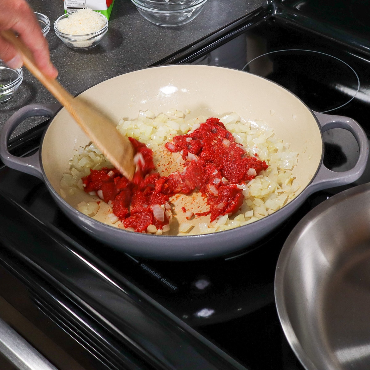 sauteing the tomato paste