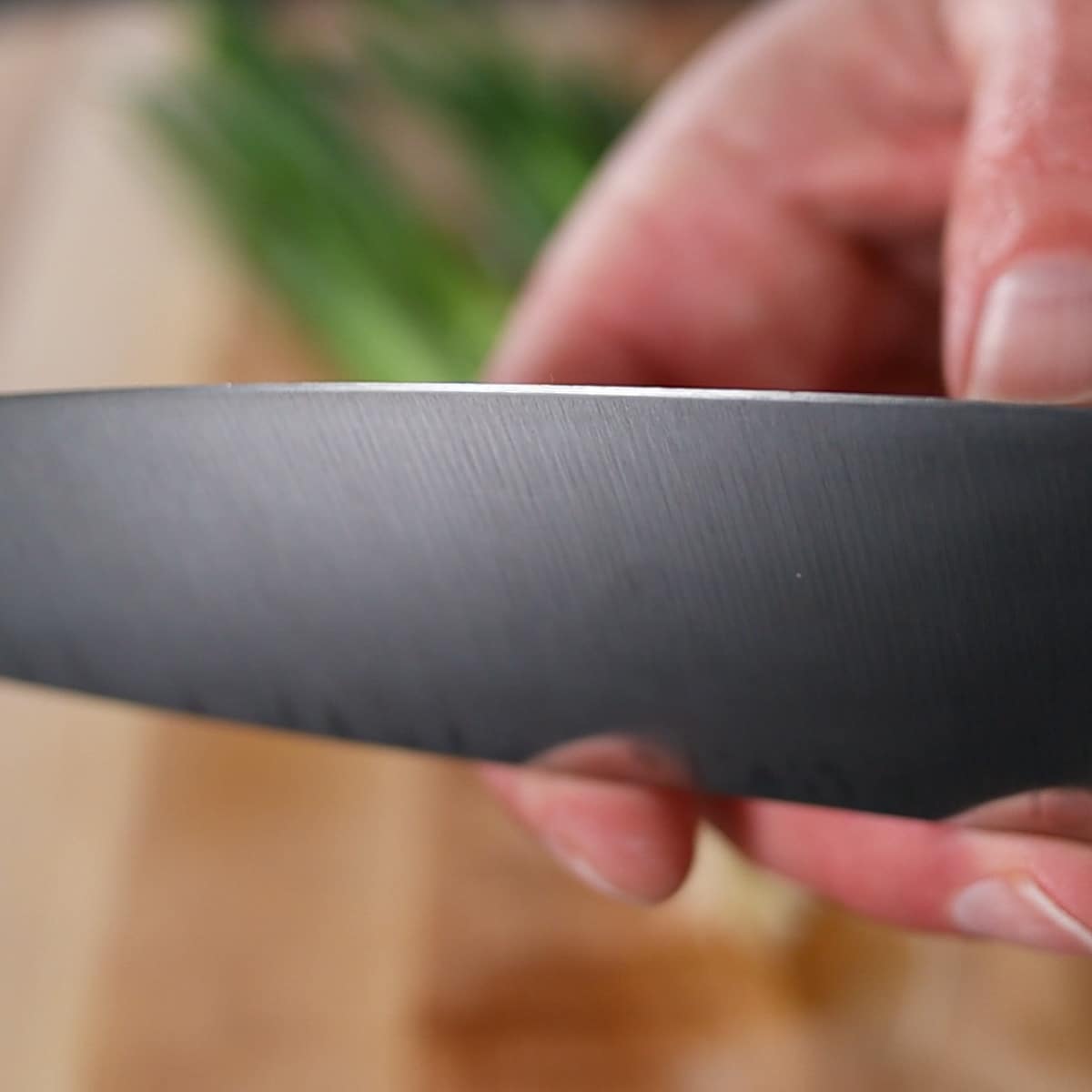 Showing the sharp blade of the knife.