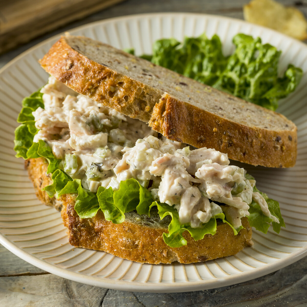chicken salad sandwich on a plate