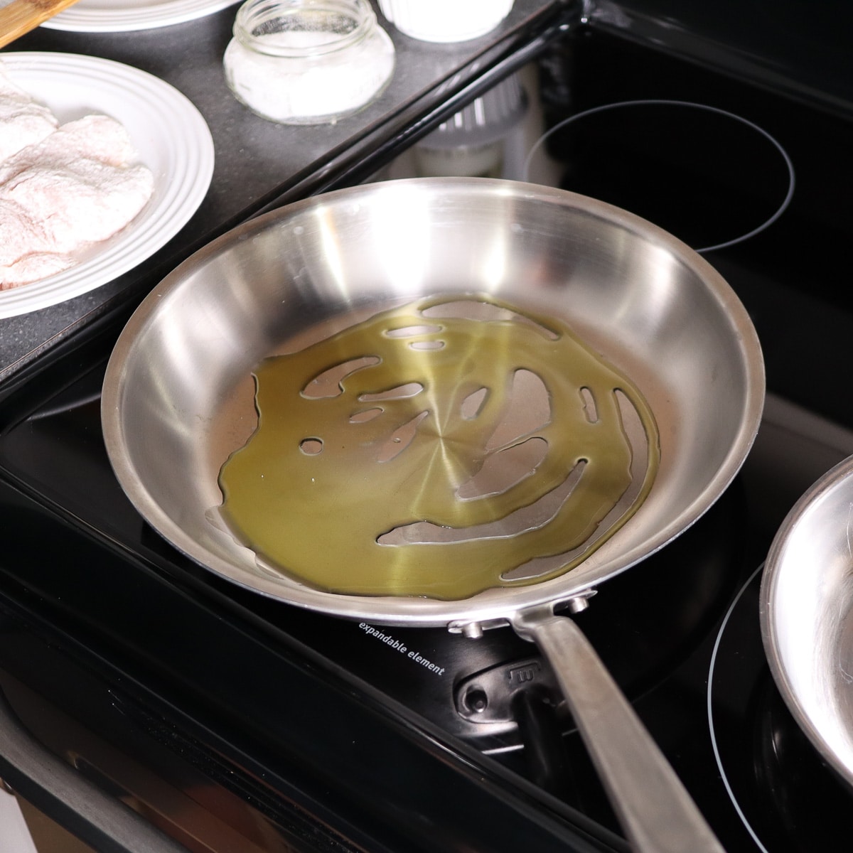 olive oil just added to a pan