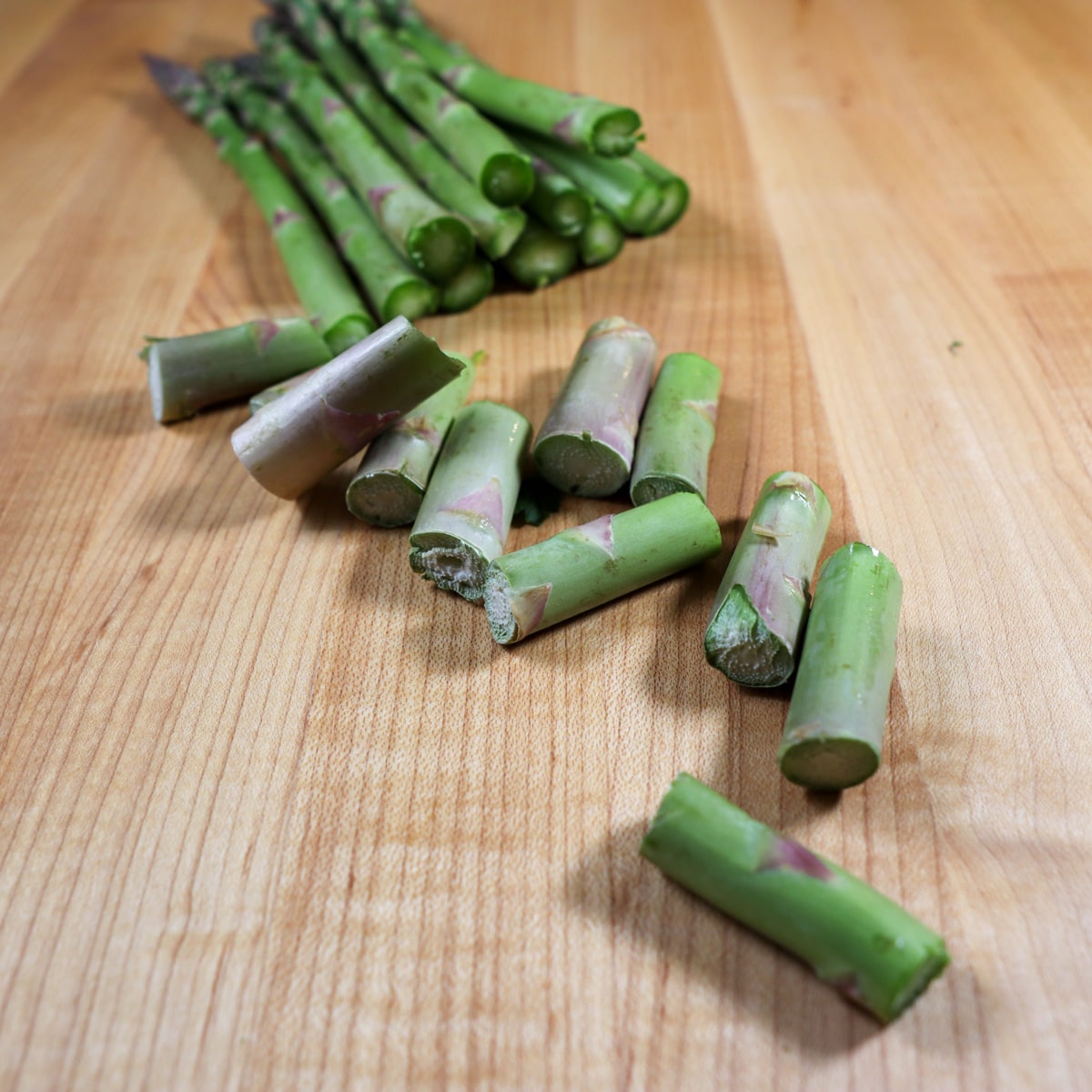 snapping asparagus by hand
