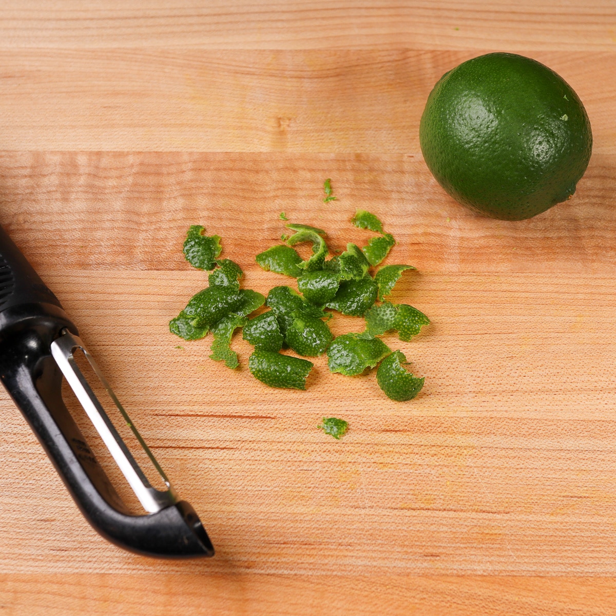 peels of lime from a peeler